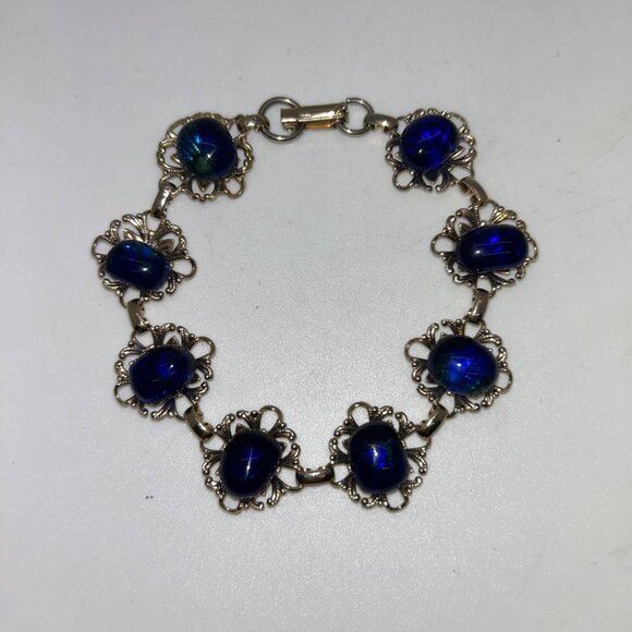 Estate Jewelry - Vintage Gold Tone Bracelet Cobalt Blue Acrylic Cabochon Floral Filigree Design
